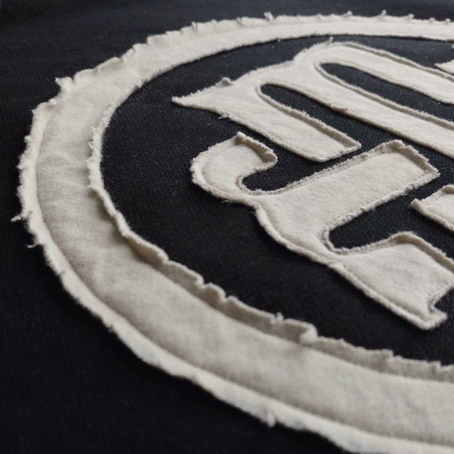 "QUALITATE" DISTRESSED JERSEY